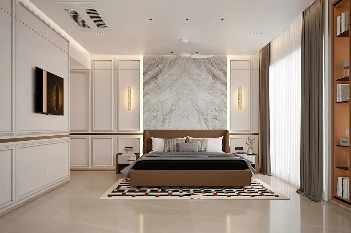 Bedroom with a book-matched marble headboard wall flanked by panelled joinery
